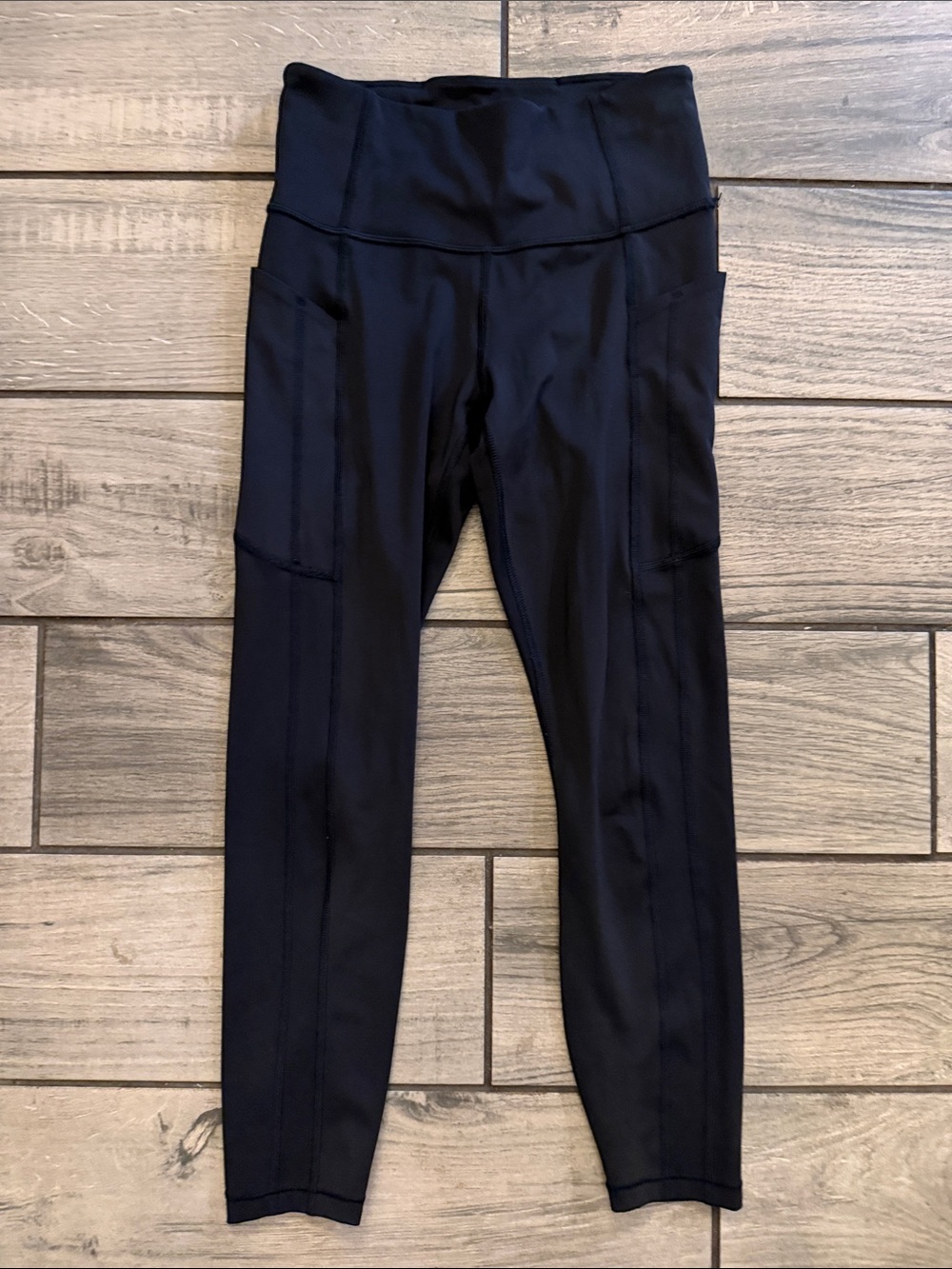 Athleta Black High-Rise Active Leggings with Side Pockets